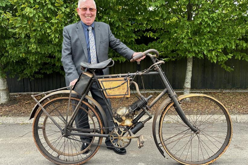 George Beale with the British Motor Traction Company motorised bicycle