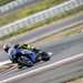 2025-on Yamaha R9 leaning right over on a corner