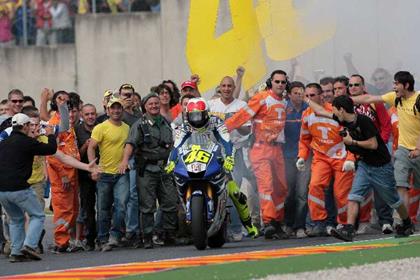 The crowd flocked on to the circuit at the Italian MotoGP