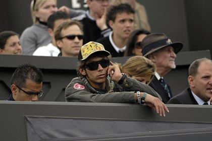 Valentino Rossi relaxes at Wimbledon after yesterday's British MotoGP (Pic: PA Photos)