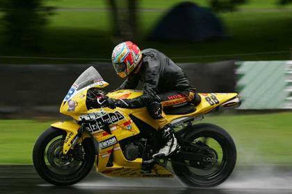 Ian Hutchinson survives the wet conditions to win at Oulton Park