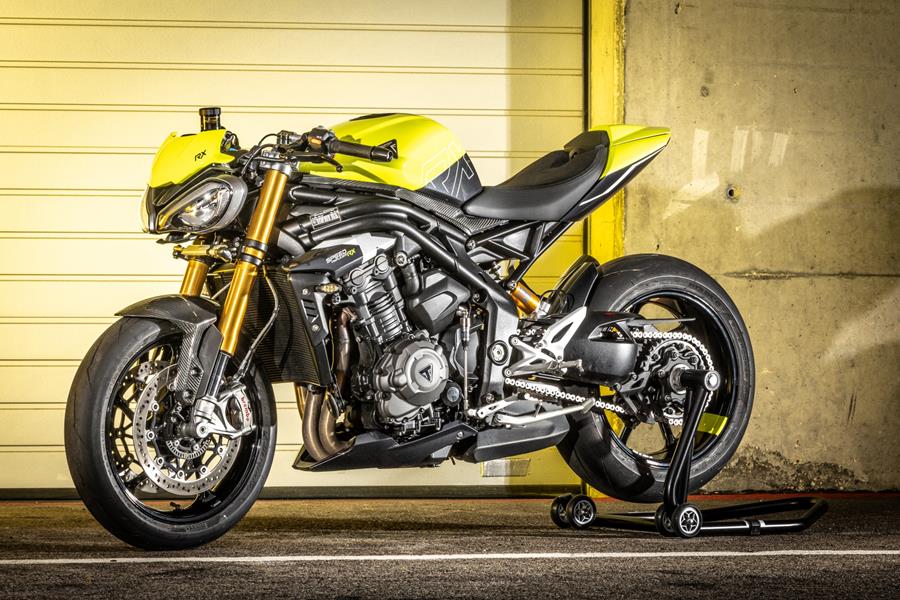 2025 Triumph Speed Triple 1200 RX, side on image showing dazzling yellow paint scheme 