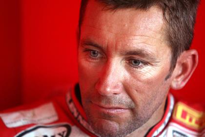 Troy Bayliss believes his championship title hopes are over after his bad luck at Brands Hatch today