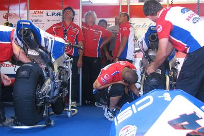 DFX Corse garage with Luca Lorrelli and Michel Fabrizio's motorcycles