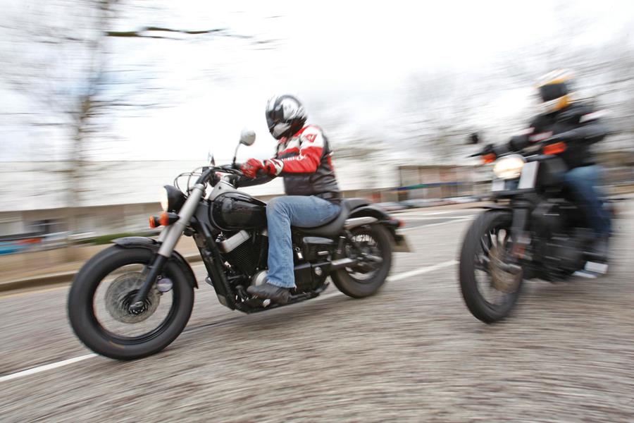 MCN pits Honda Shadow 750 against Harley-Davidson Sportster Iron 883 on twin test