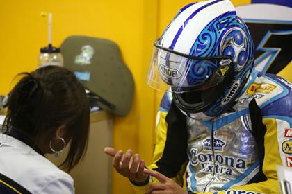 Alstare suzuki's Ykio Kagayama inspects his broken hand