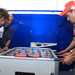 Valentino Rossi and Casey Stoner battle it out over a game of table football