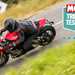 LS2 Carbon GP helmet worn on a red Triumph Speed Triple 1200RR