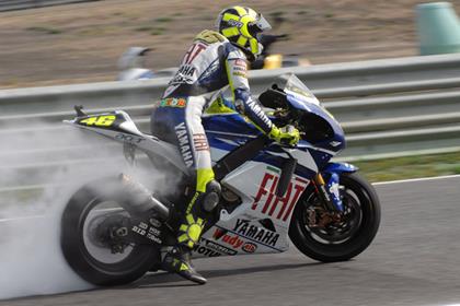 Valentino Rossi celebrates his win in Portugal which seems to have clinched the Michelin deal