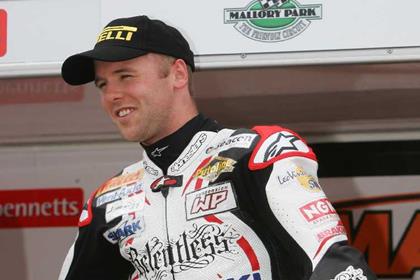 Relentless Suzuki's Michael Laverty celebrates his championship title and race victory at Donington Park