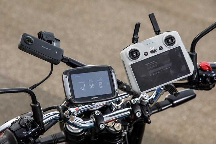 A sat nave and drone equipment attached to handlebars