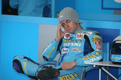 Rizla Suzuki's Cal Crutchlow needs to have blood drained from his arm following his crash at Donington Park