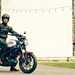 A rider sits on a Yamaha XSR125