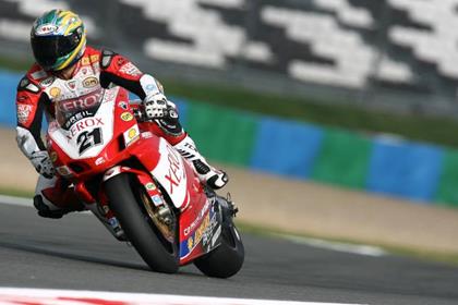 Ducati's Troy Bayliss has taken provisional pole for the French World Superbike round at Magny Cours