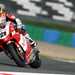Ducati's Troy Bayliss has taken provisional pole for the French World Superbike round at Magny Cours