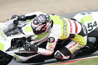 Kenan Sofuoglu has taken pole position for the French World Supersport race at Magny Cours