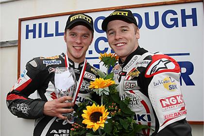 Relentless Suzuki's Ian Lowry and Michael Laverty celebrate their successes at the Sunflower Trophy races