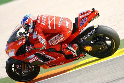 Casey Stoner shrugs off back injury to dominate in Valencia 