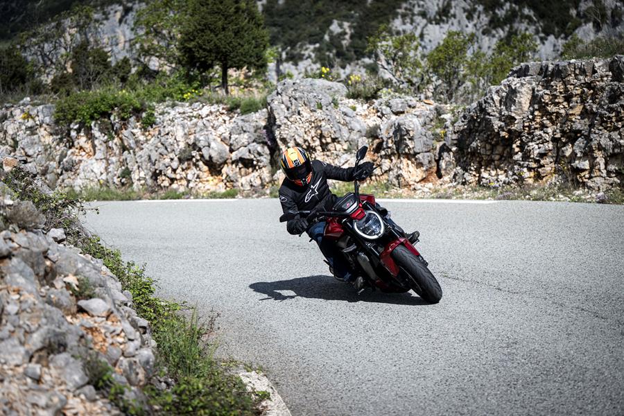 2025-on Ducati XDiavel V4 riding along carving corners