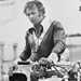 Evel Knievel stood with a motorcycle