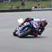 Bradley Ray's Raceways Racing Yamaha R1 spits flames going through the final corner at Donington Park.