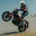 Yamaha XSR125 wheelie on beach