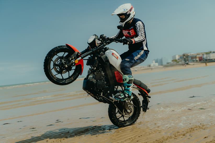 Yamaha XSR125 wheelie on beach