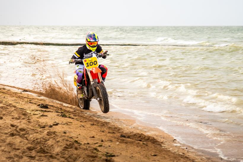 Thornton Hundred CR500 tribute pulling a wheelie on sand
