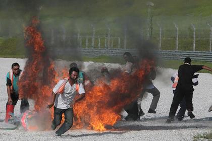 Pedrosa's crash ended in a huge fireball and a broken hand