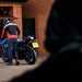 A motorcycle thief scoping out a garage