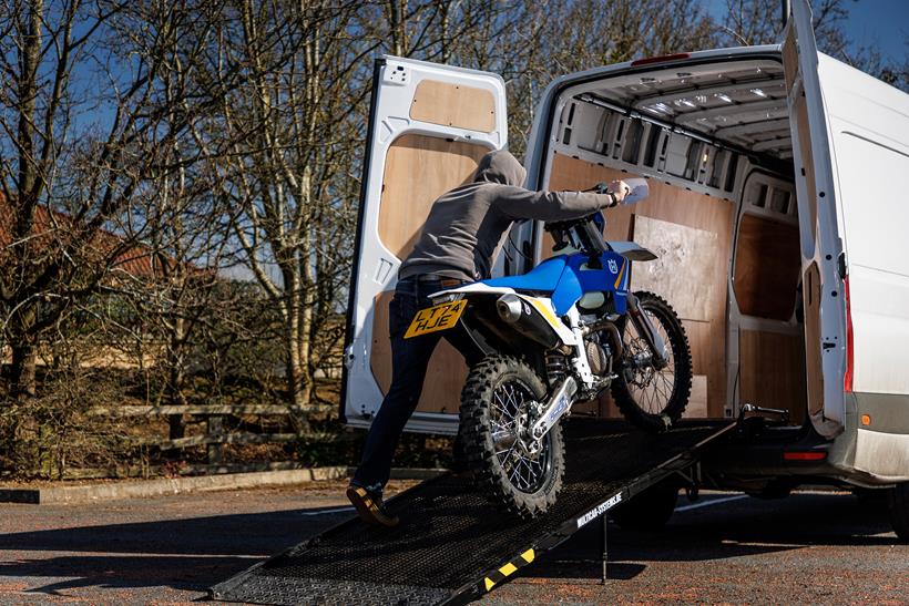 Loading a stolen motorcycle into a van