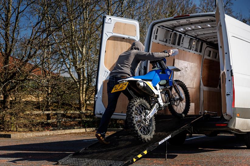 Loading a stolen motorcycle into a van