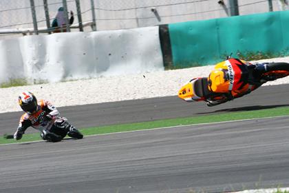 Pedrosa's crash left him with a double broken hand