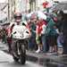 Carl Fogarty rides through crowds in Ballymoney