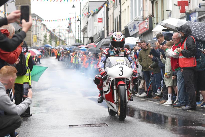 Jonathan Rea rides through the crowds