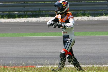 Dani Pedrosa walking back to the pits after his Sepang crash last month