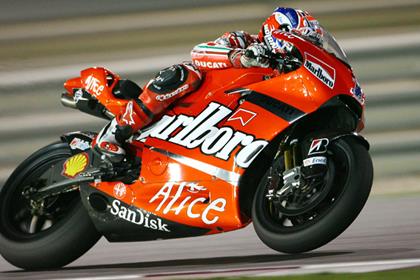 Casey Stoner took just 14 laps to beat his 2007 lap record at the start of the first official night test in Qatar