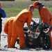 Max Biaggi broke his wrist in a 170mph crash in Phillip Island