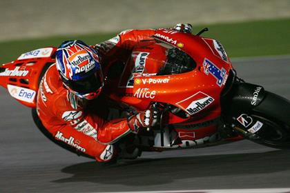 Defending champion Casey Stoner went fastest in the first practice session of the season