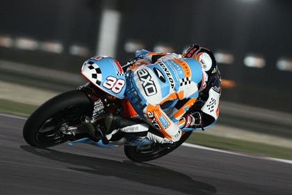 Britain's Bradley Smith has taken his first 125GP pole position in Qatar tonight