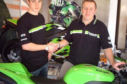 Alex Camier has signed for Bournemouth Hawk Kawasaki - pictured with Bournemouth Kawasaki MD Peter Extance