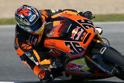 Mika Kallio wins after Marco Simoncelli and Alvaro Bautista crash at the front