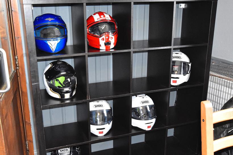 Storage shelf with motorcycle helmets