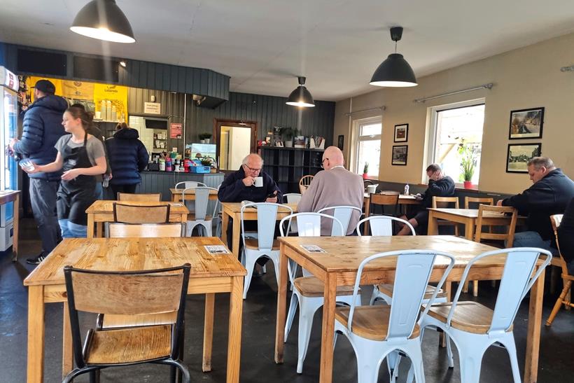 People sitting around inside the Yondermann Café