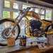 A motorbike in Custom Cafes window display