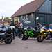 People and motorcycles outside Amici Coffee