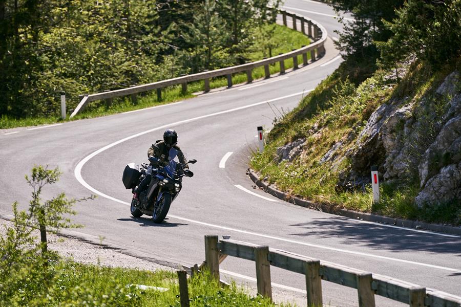 2025-on Yamaha Tracer 9 GT+ touring down a twisty road