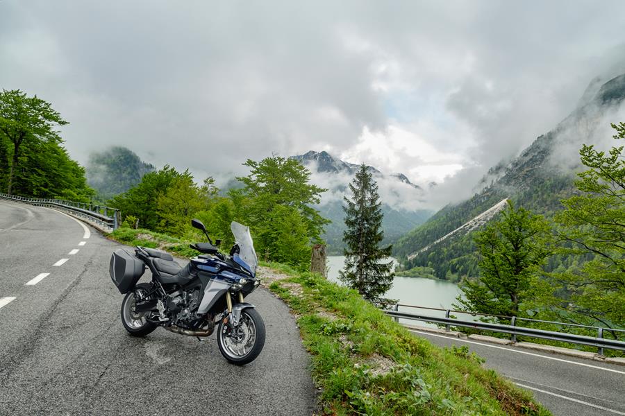 2025-on Yamaha Tracer 9 GT+ static shot of the bike parked on the edge of a mountain road