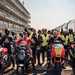 Randy Mamola with multiple riders in pitlane