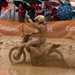 Suzuki's Steve Ramon celebrates in the 'mud bath' of Bellpuig